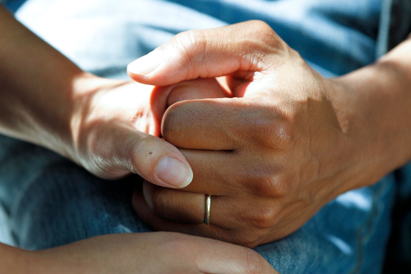 Comforting clasped hands